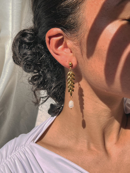 unieke rvs oorbellen van goud met parels